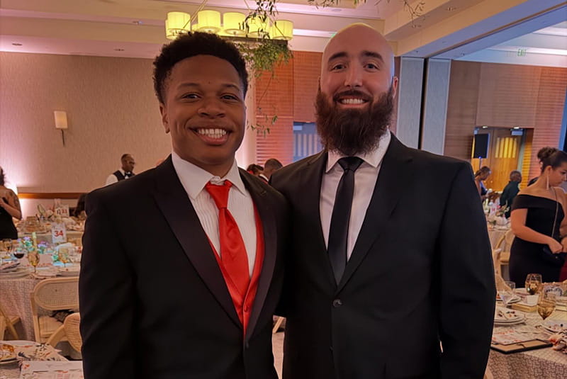Ameer Chambers with his athletic trainer, Jeff Wiseman