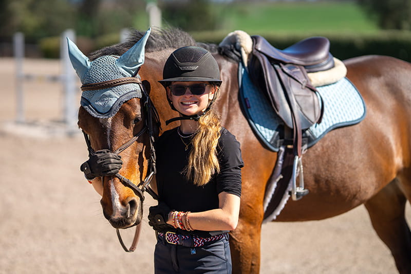 Ryan Haselden and her horse, Carla, at a barn in Florida in January 2025