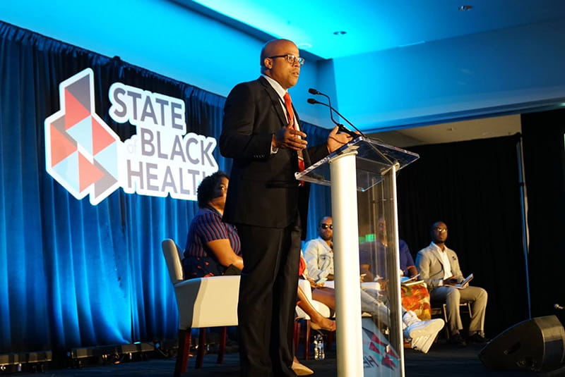 James Young II speaking at the State of Black Health Conference in Atlanta in 2018