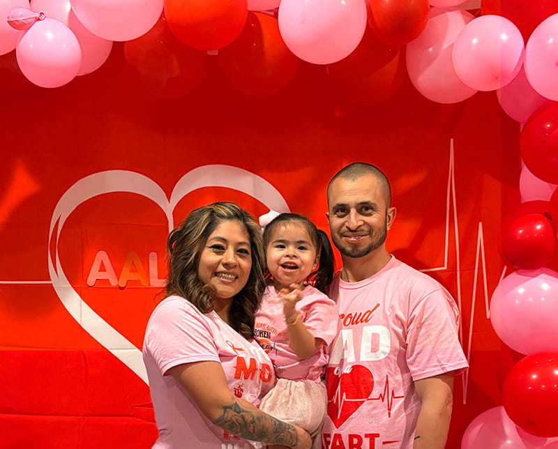 Aaliyah with her parents, Michelle and Ernesto, on her first "heartiversary," a year after her heart transplant