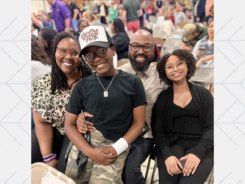 Tanya Chapman Griffin with her husband, Ontario, and daughters Laila (left) and Lennox