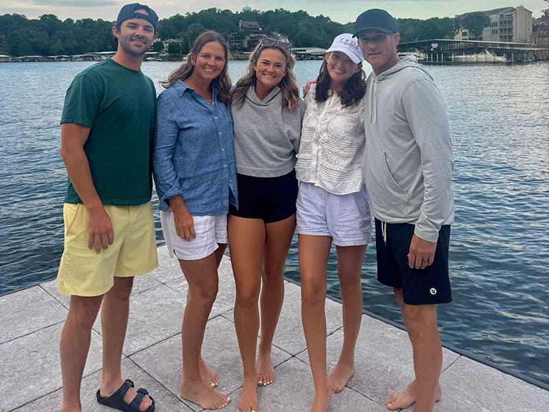 Dan (right) with his family during a lake outing: son Jake, wife Lisa, daughters Kate and Grace