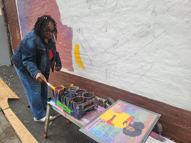 Portrait artist Minnie Watkins now uses her talent to tell her stroke story. 