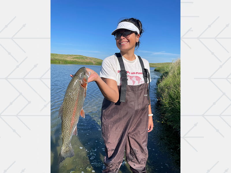 Marcella Prokop holds up her big catch while fishing in Martin, South Dakota, in 2024