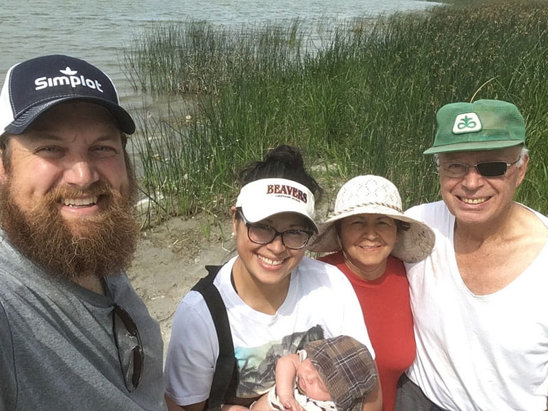 Marcella Prokop holds baby Cedar on a fishing outing with Sean and her parents, Jim and Maria Prokop