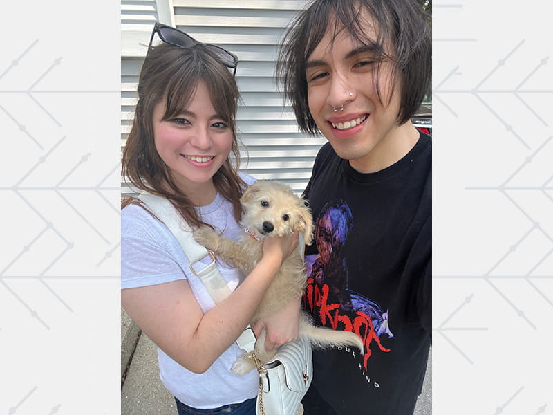 Brian Frausto with his girlfriend, Taylor Pappert, and their dog, Penny, in 2023.
