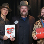 Coy Bowles, Jimmy de Martini and John Hopkins of the Zac Brown Band say thank you to nurses. (Photo by Getty Images)
