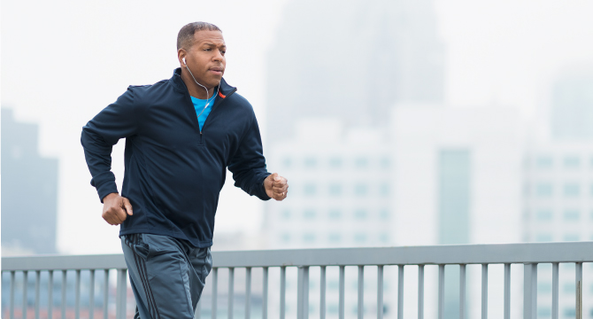 Man running through city