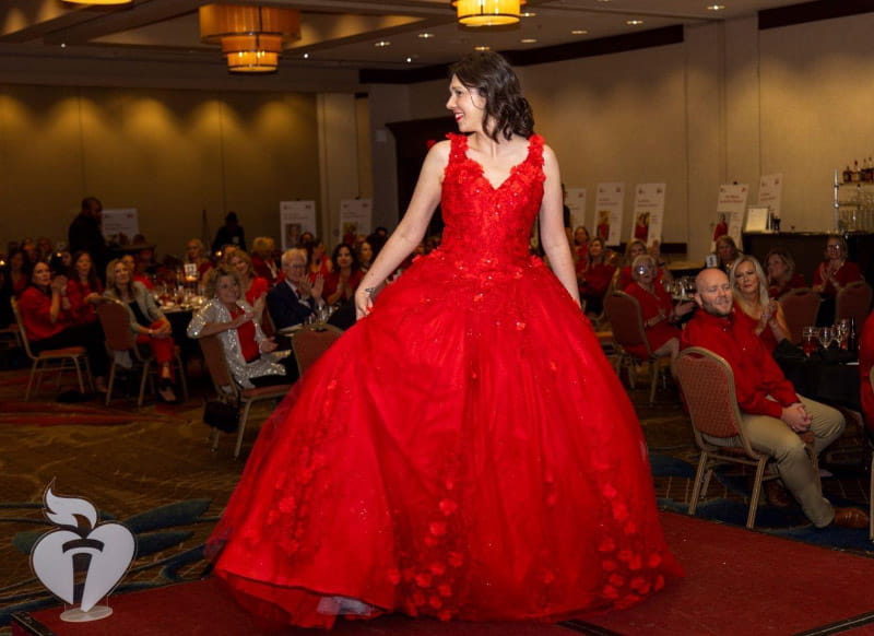 Amy Deike wearing a red gown at the 2023 Go Red for Women event in Des Moines, Iowa. (Photo courtesy of Amy Deike)