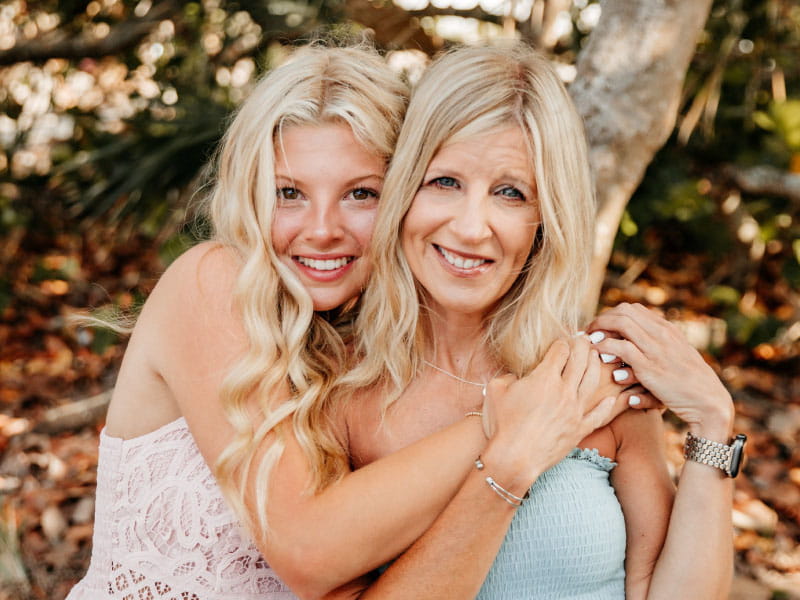 Stroke survivor Shelley Marshall (right) with her daughter, Kennley McCown. (Photo courtesy of Black Pineapple Photography)