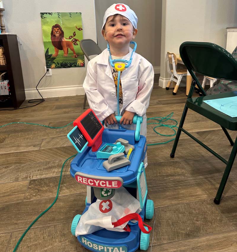 William Cervantes, now 3, playing dress-up as a health care provider. (Photo courtesy of the Cervantes family)