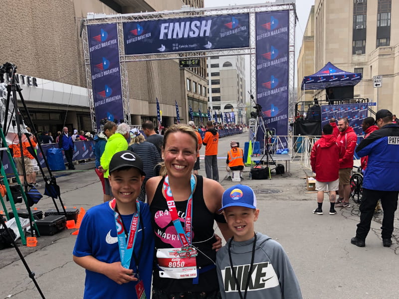 Kelly Naab with her sons at the finish line of the Kaleida Health Heart to Heart Relay in 2019. From left: Cooper, Kelly, and Ryder Naab. (Photo courtesy of Kelly Naab)