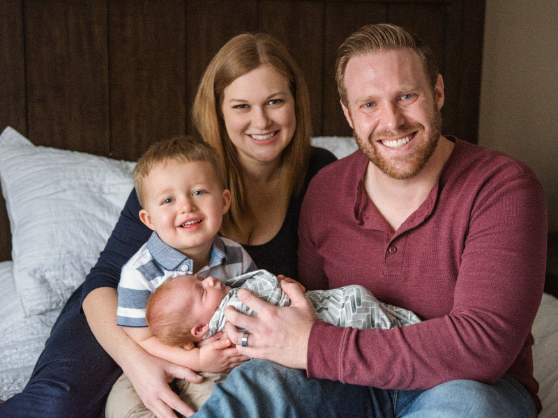The Schammert family: Kym, Bill, and sons Cameron and Theo. (Photo by Emily Hardy Photography)