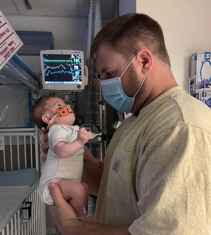 Jerrid Conway holds his daughter Sadie in the hospital. (Photo courtesy of the Conway family)
