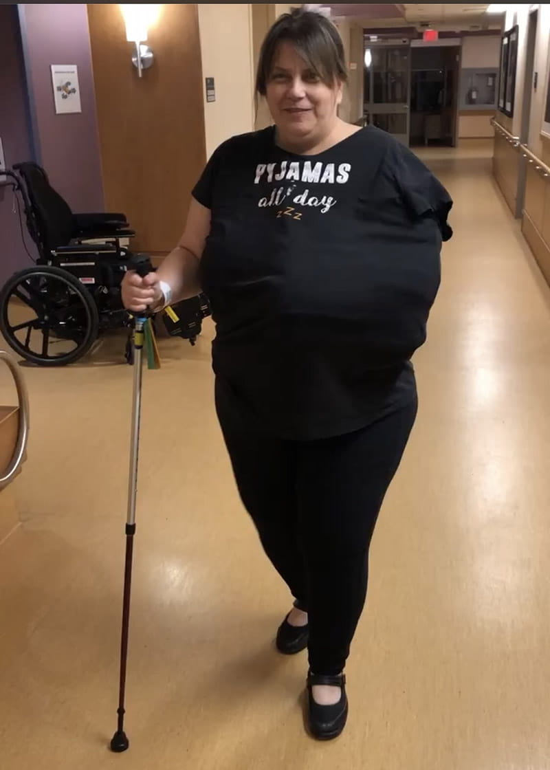 Victoria Shepherd walking with a cane in rehab. (Photo courtesy of Victoria Shepherd)