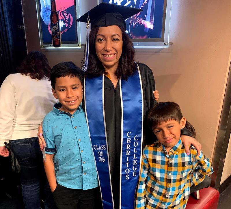 Andrea Paez with her sons at her graduation in 2019. (Photo courtesy of Andrea Paez)