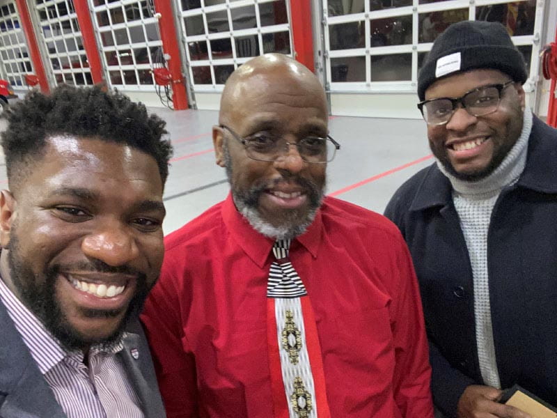 Christopher Holton (center) collapsed on a trail during a walk and was saved by two cyclists, Bryan Buckley (left) and Isang Isang. (Photo courtesy of Bryan Buckley)