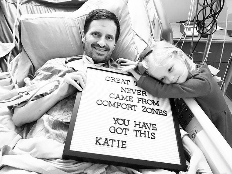 Scott Kern (left) recovering in the hospital with his daughter, Katie, at his side. (Photo courtesy of Trisha Kern)