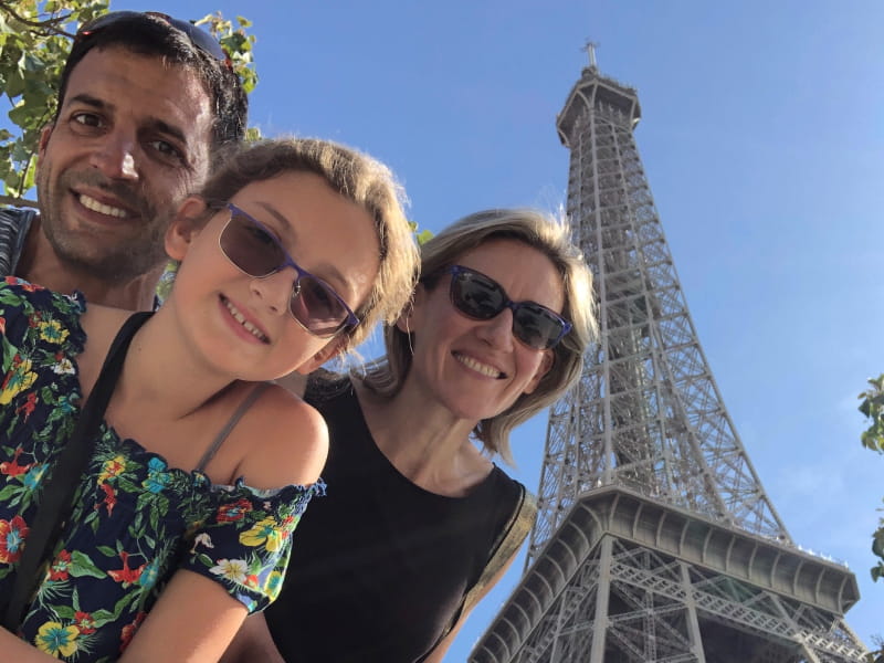 Lara Asch with her parents, Drs. Federico Asch and Ana Barac, in Paris this summer. Lara was diagnosed with high cholesterol and high triglycerides at age 10. (Photo courtesy of Federico Asch)