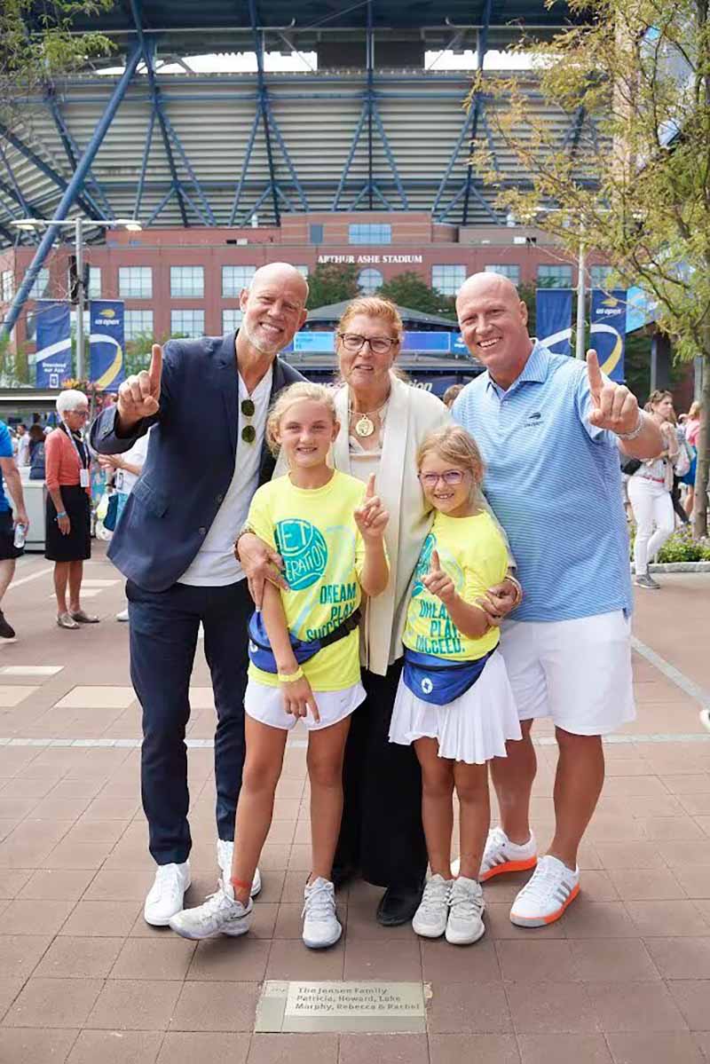 Murphy Jensen (left) with his mother, Patricia (center), his brother, Luke (right) and his nieces at the 2019 US Open. (Photo courtesy of USTA Foundation)