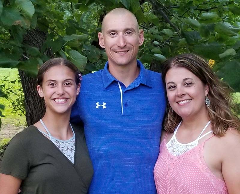Chad Lorenz (center) with his daughter, Autumn and wife, Laura. (Photo by John McBride)