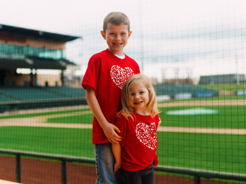 Four-year-old congenital heart defect survivor Molly Tittsworth (right) with her big brother, McCoy. (Photo by R. Dodson Photography)