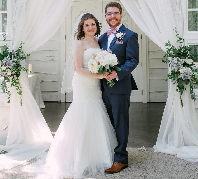 Trenton Cary (right) and his wife, Jessica, on their wedding day in 2018. (Photo courtesy of David Cary)