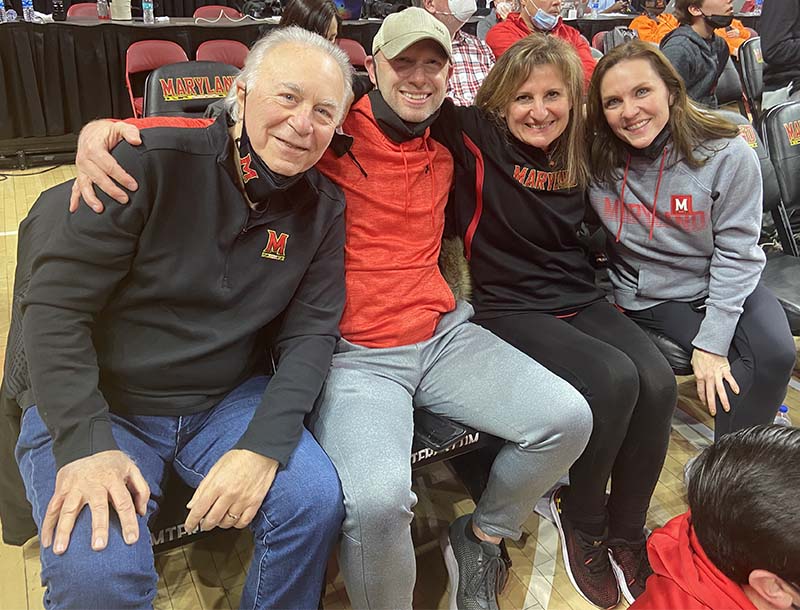 Stan Goldstein with his wife and two friends at a University of Maryland basketball game. From left: Stan, Scott Wohl, Sara Goldstein and Erinn Dooley. (Photo courtesy of Stan Goldstein)
