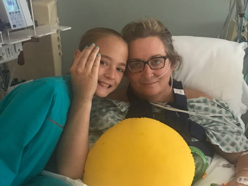 Cardiac arrest and heart attack survivor Christi Eberhardt (right) with her daughter, Emily. (Photo courtesy of Christi Eberhardt)