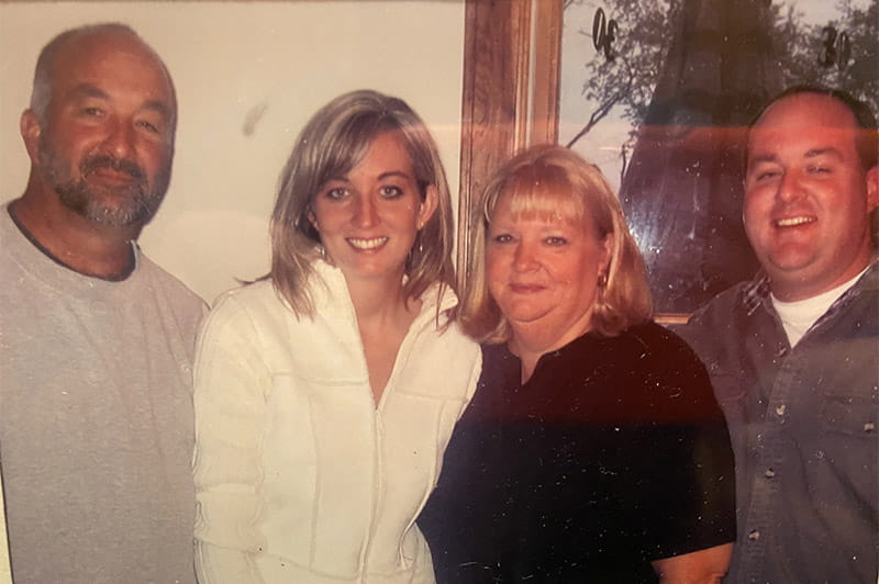 Christi Eberhardt with her parents and brother, from left: Tom Groetz, Christi, Debbie Groetz and Gary Groetz. (Photo courtesy of Christi Eberhardt)