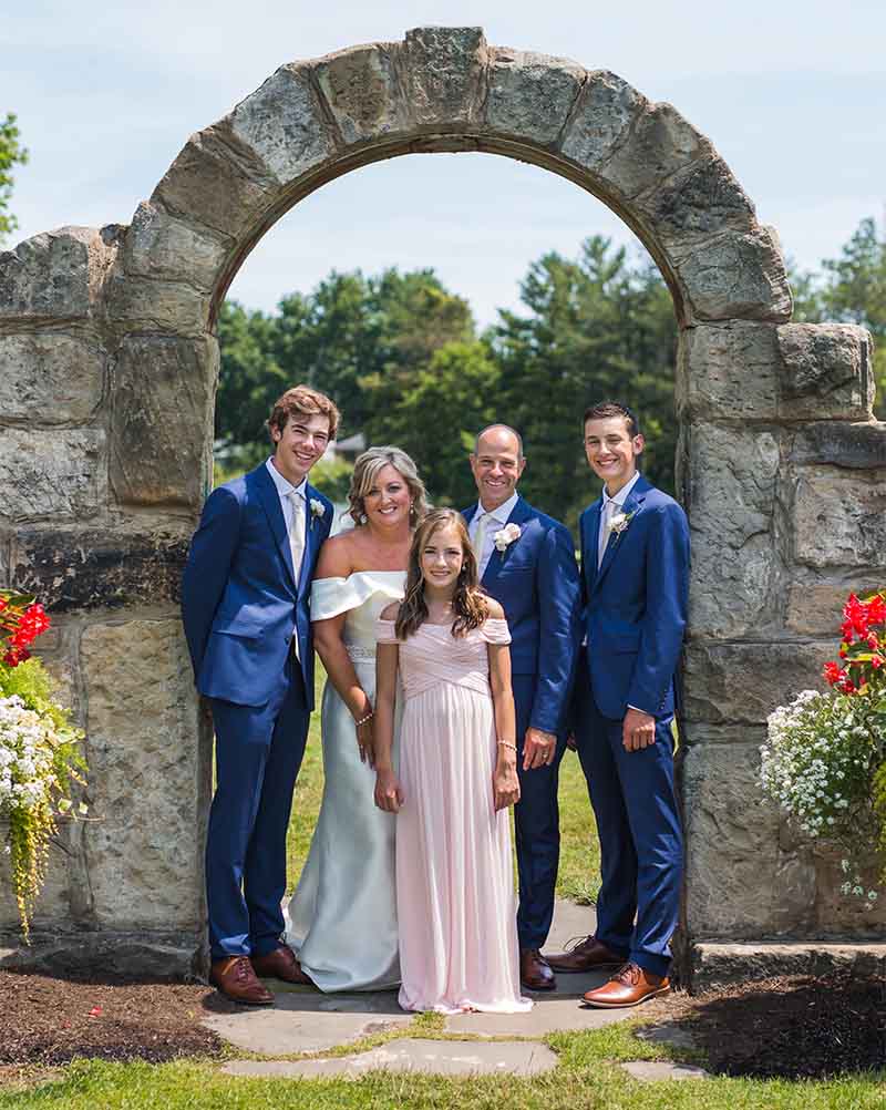 Christi Eberhardt at her wedding, from left: Stepson Sam, Christi, daughter Emily, husband Greg and stepson Ben. (Photo courtesy of Christi Eberhardt)