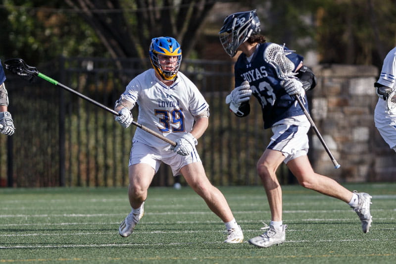 A lacrosse ball walloped Peter Laake's chest during a game, causing a type of cardiac arrest called commotio cordis. (Photo courtesy of Gwin Photography)