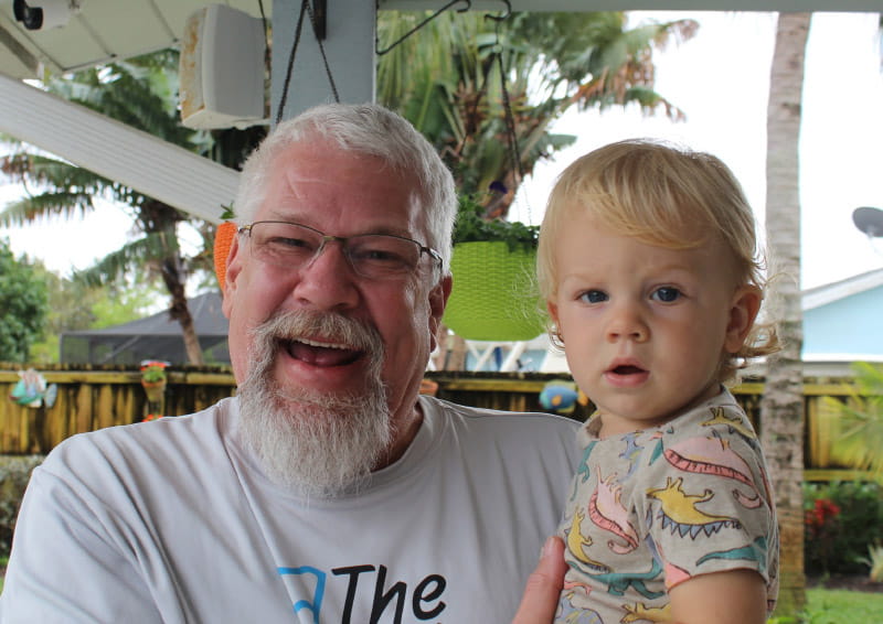 Mike Button (left) with his grandson, Jensen. (Photo courtesy of Mike Button)