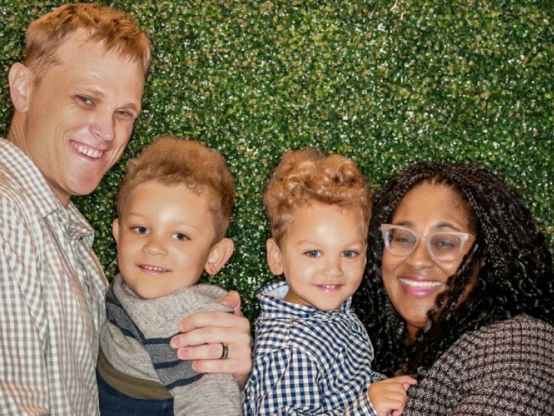 Cardiac arrest and dilated cardiomyopathy survivor LaNysha Adams with her family. From left: Husband David Foss, sons Davidson and Donovan, and LaNysha. (Photo courtesy of LaNysha Adams)