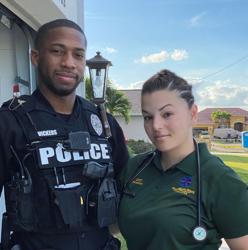 Yanela Vickers, a certified EMT and paramedic (right), with her husband, Horace, a police officer. (Photo courtesy of Yanela Vickers)