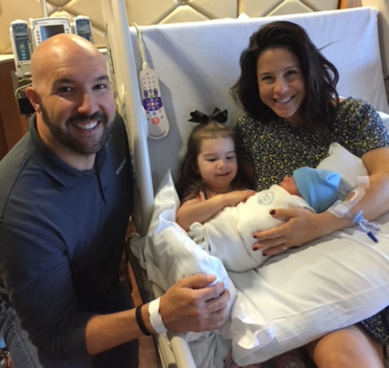 Lauren Lowrey (far right) with husband Blake (left) and daughter Sammy holding Landon shortly after he was born. (Photo courtesy of Lauren Lowrey)