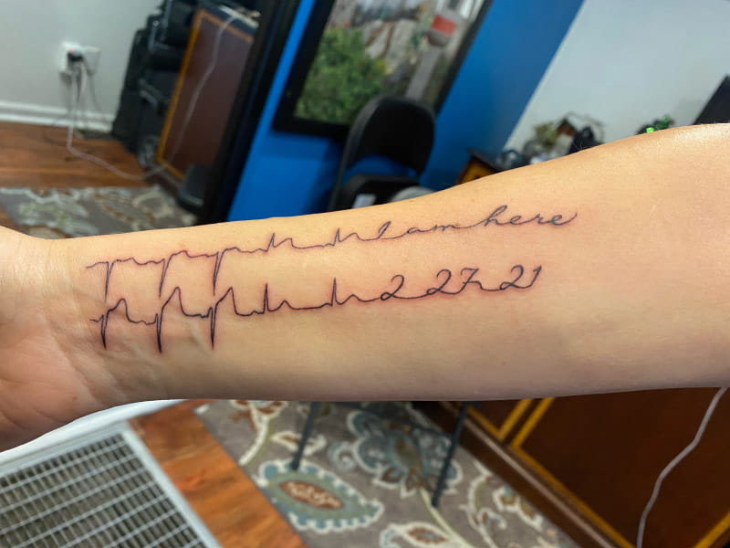 Ratona Harr has a tattoo to commemorate her heart attack survival. It shows her electrocardiogram (EKG) at the time and the date it happened. (Photo courtesy of Ratona Harr)