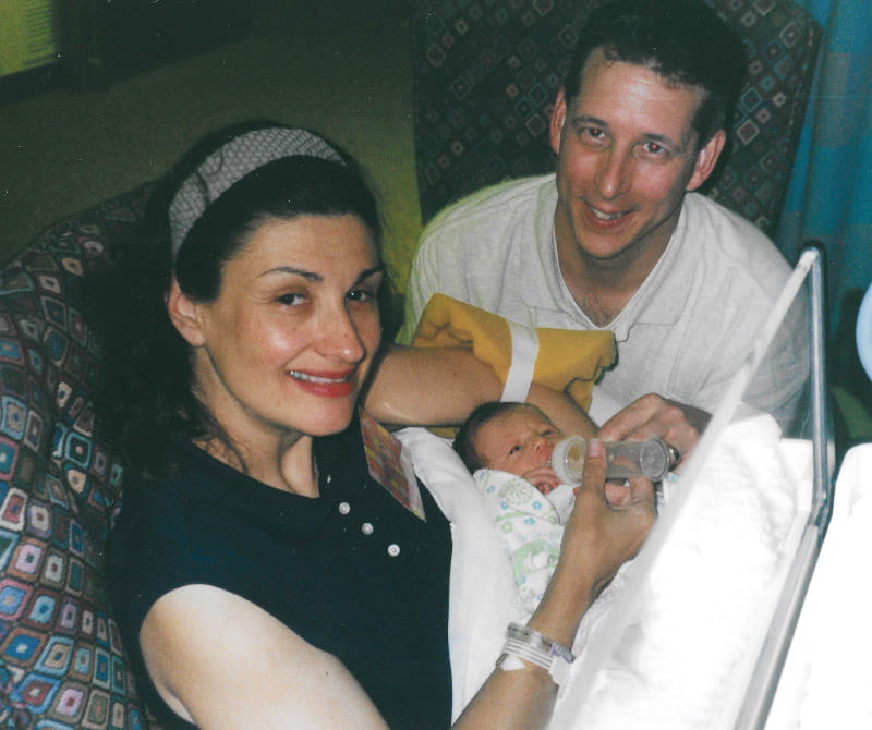 Debi (left) and Brian Corrigan holding newborn Zoe during her recovery from open-heart surgery. (Photo courtesy of the Corrigan family)