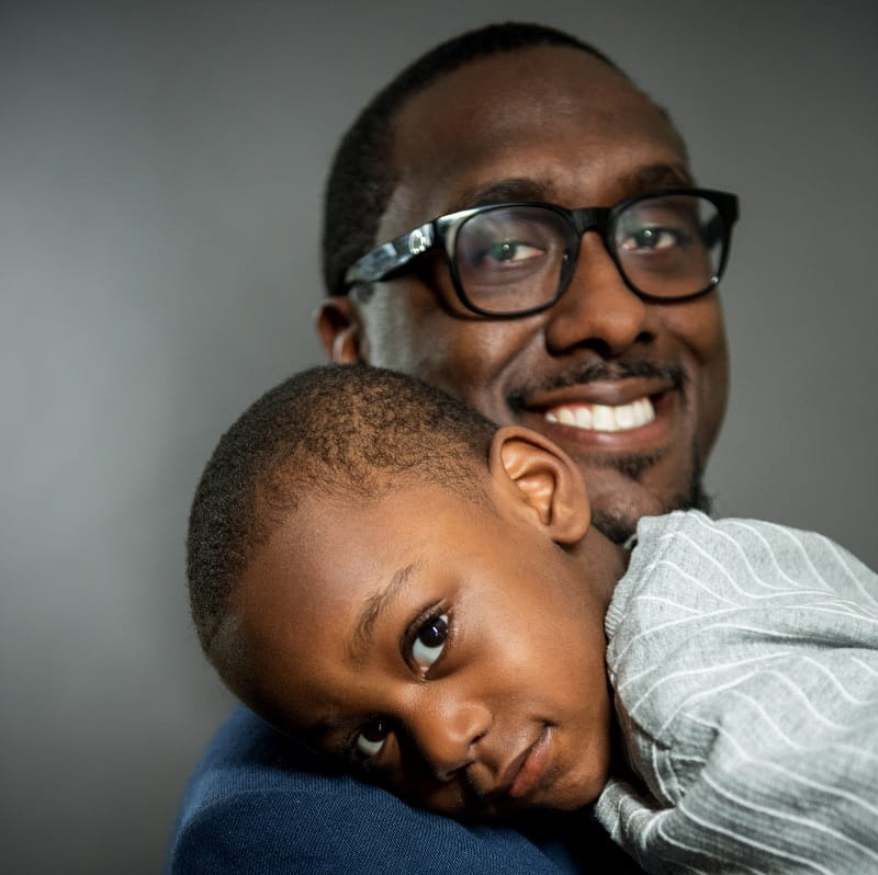 Charles Daniels, Jr. introduced his son, Clayton, to Charles, Sr. (Photo by Liz Linder)