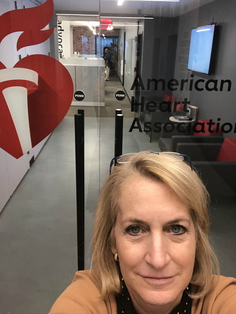 Stacey in front of the AHA’s New York office. (Photo courtesy of Dr. Stacey Rosen)