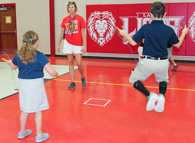 Sandy Lightfoot with kids jumping rope
