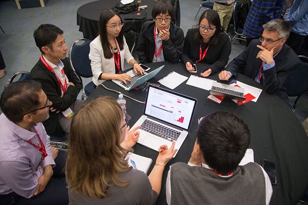 group discussing at round table