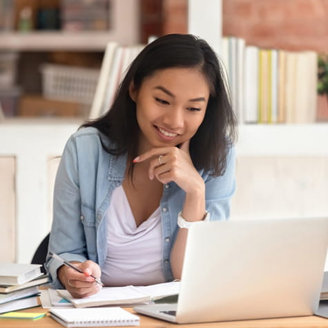 Professional woman behind laptop