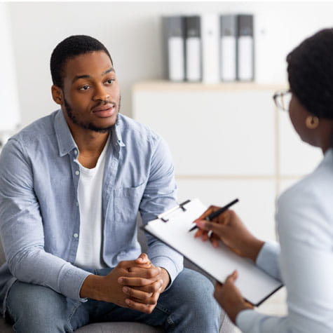 Black male patient in consultation