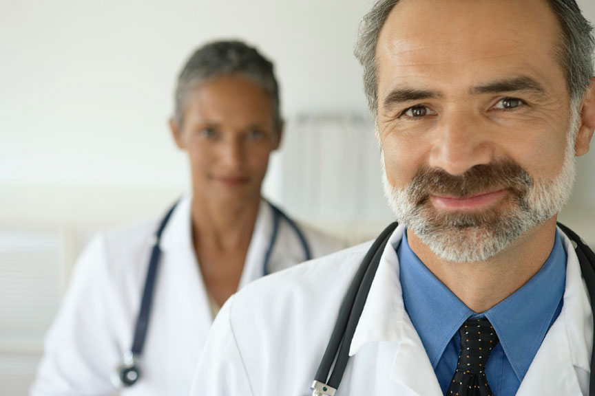 Closeup of smiling, confident doctors