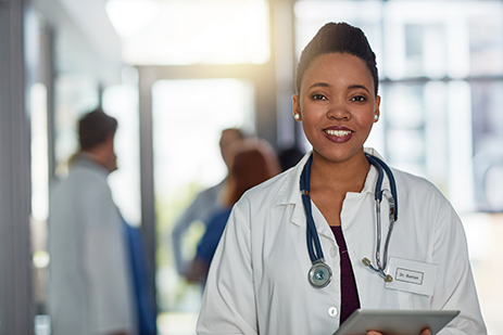 stock photo of female doctor smiling at camera