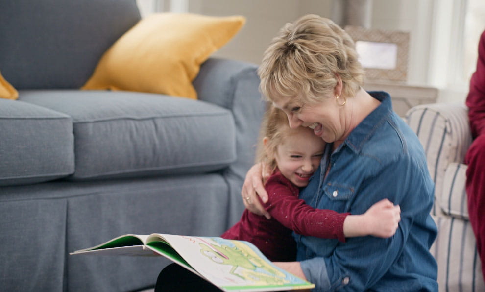 Gail Hogan hugs granddaughter