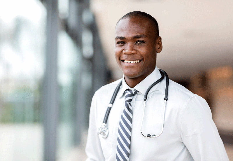 smiling young doctor wearing stethoscope
