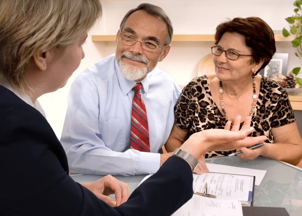 financial planner with male and female couple