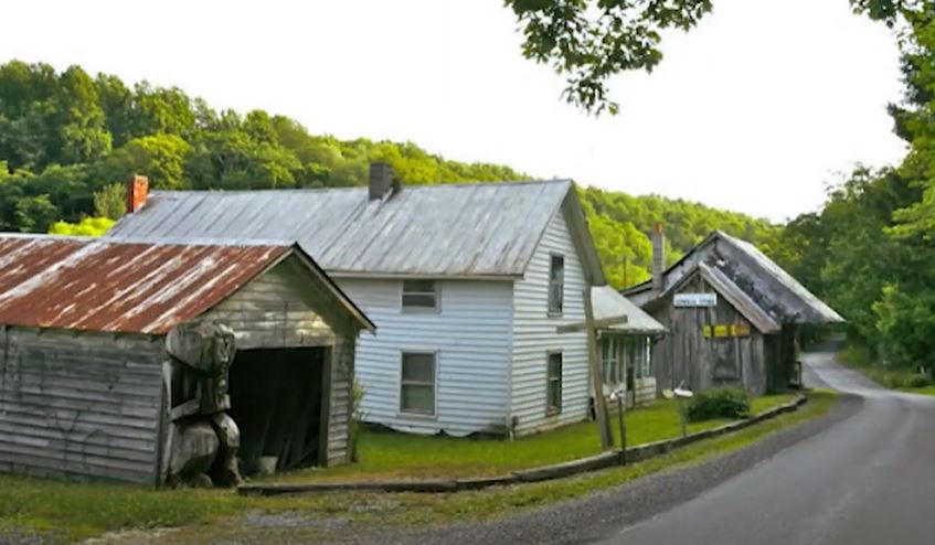 photo of house and barn along an Appalachian road